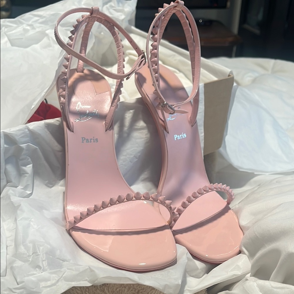Christian Louboutin “So Me 100”Rosy Heels with Ankle Strap and Studded Design.